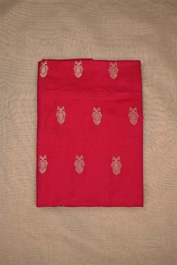 Red Banarasi Silk fabric with gold embroidered floral patterns on beige background