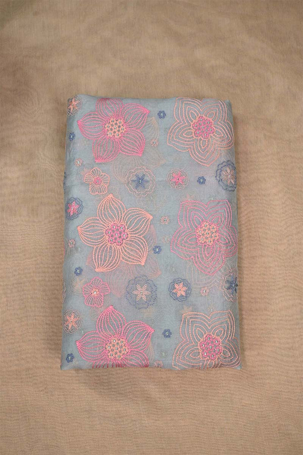 Powder blue organza Silk fabric with multicolor floral embroidery on beige embroidery