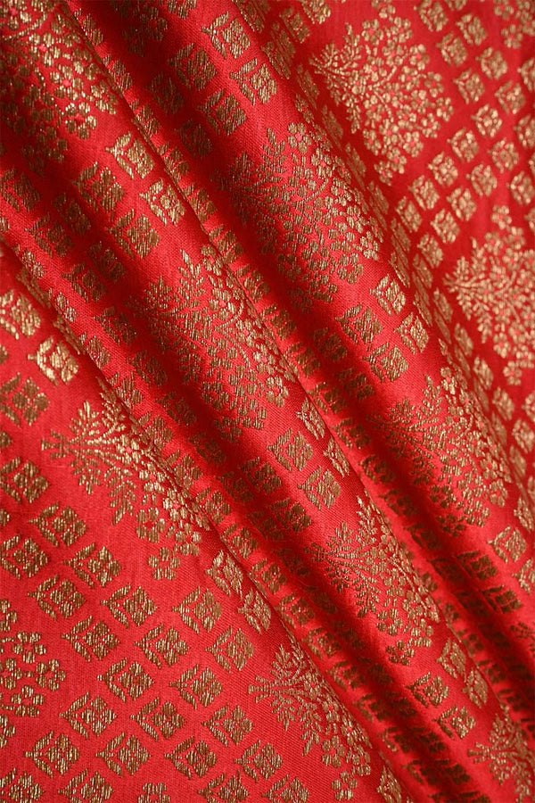 Red fabric with antique intricate patterns