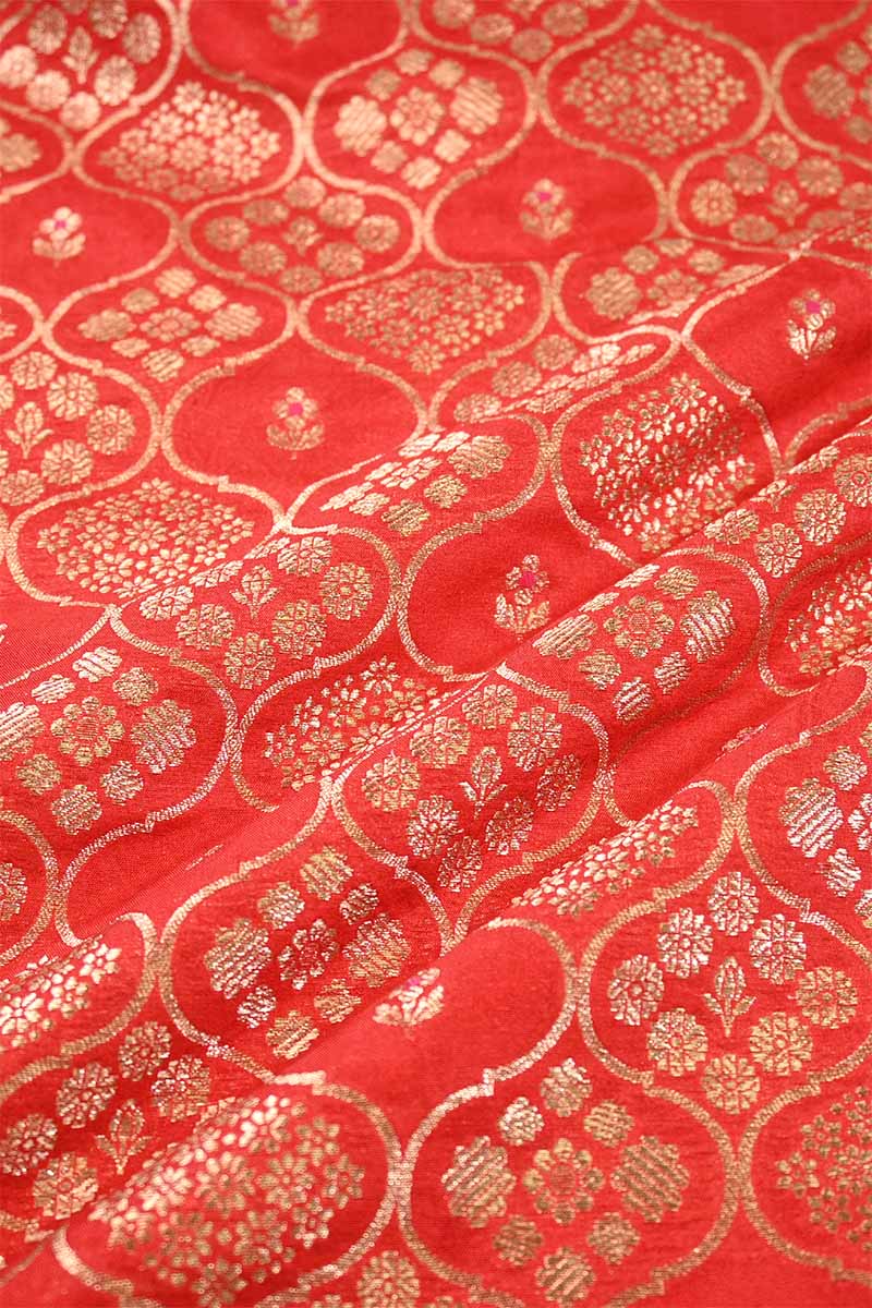 Red fabric with gold floral patterns