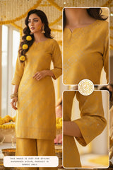 Woman wearing a yellow Banarasi silk outfit in Haldi ceremony with close-up details