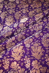 Purple fabric with gold floral patterns