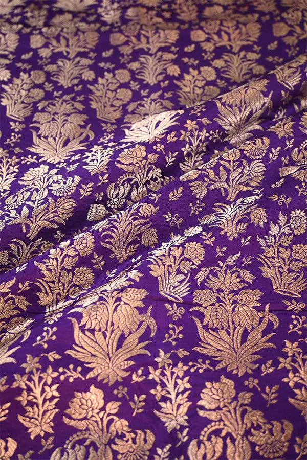 Purple fabric with gold floral patterns
