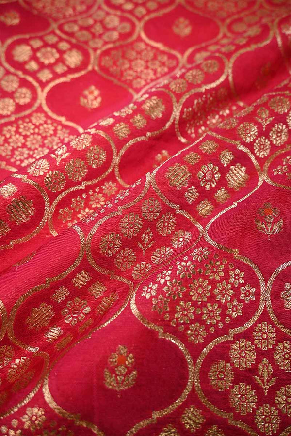 Red fabric with gold intricate patterns