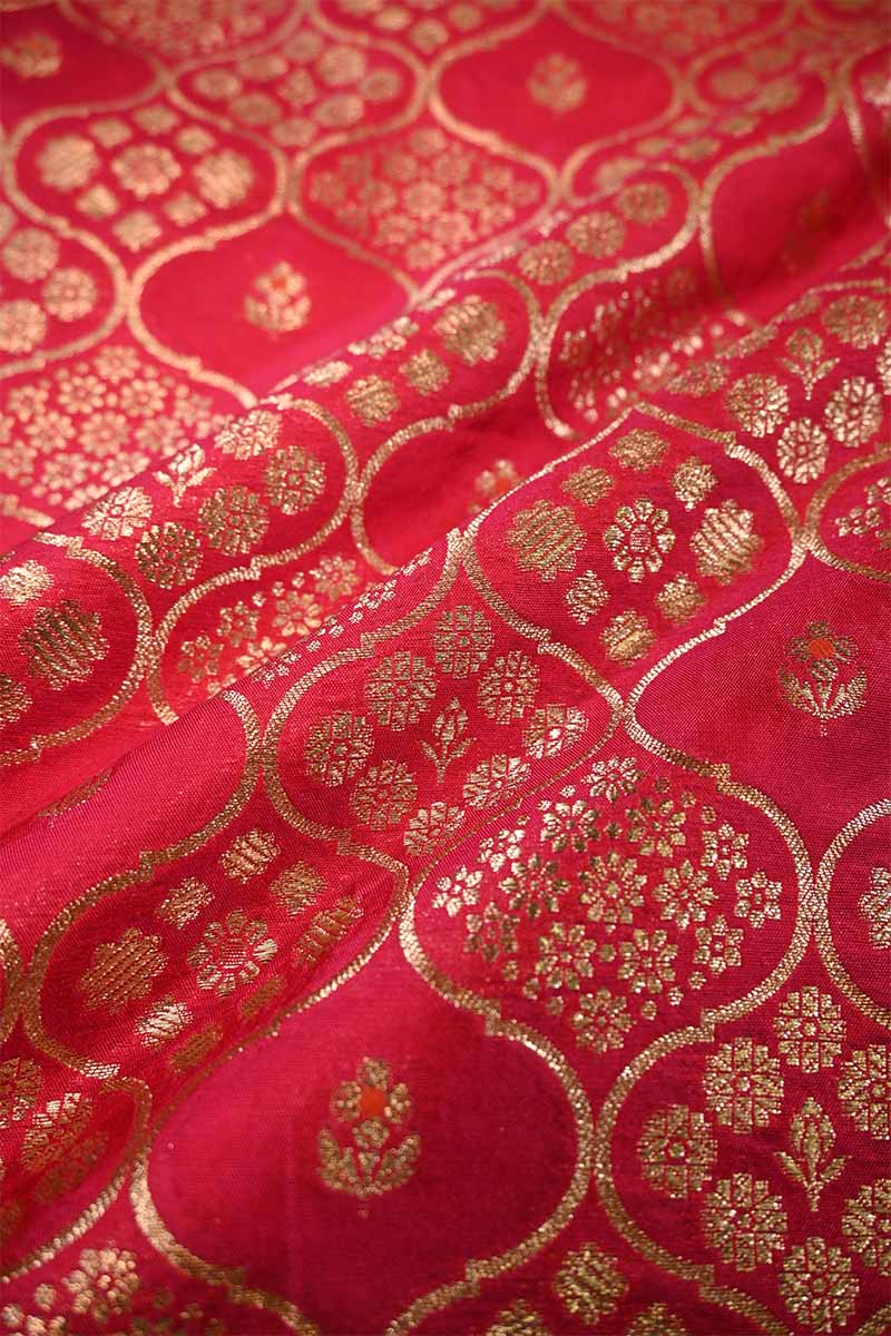 Red fabric with gold intricate patterns