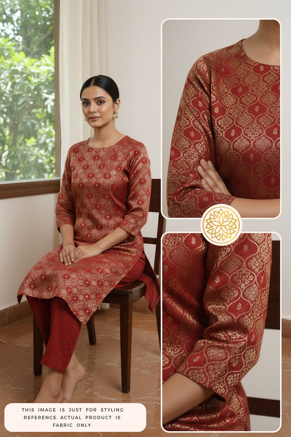 Woman wearing a red Banarasi kurti and pant with intricate patterns, sitting on a brown chair with closeup details