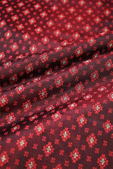 Red fabric with small floral pattern