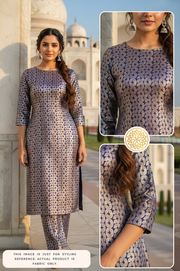 Woman wearing a blue Banarasi silk outfit with close-up details in front of a historical building.