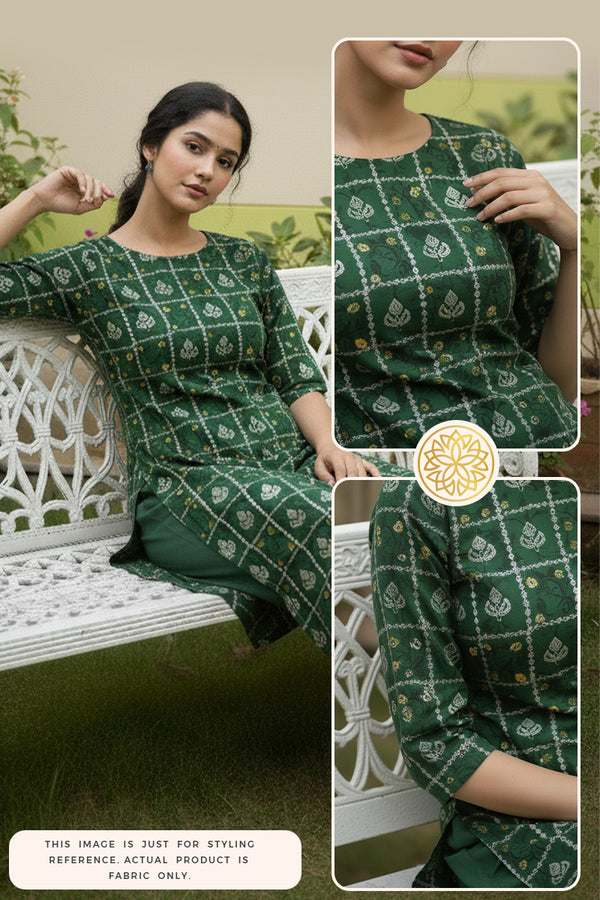 Woman wearing a green Bandhani kurti pant outfit sitting on a white bench in the garden