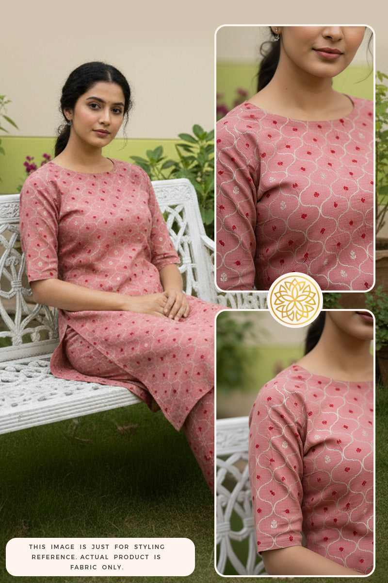 Woman wearing a pink Bandhani kurti pant outfit sitting on a white bench in the garden