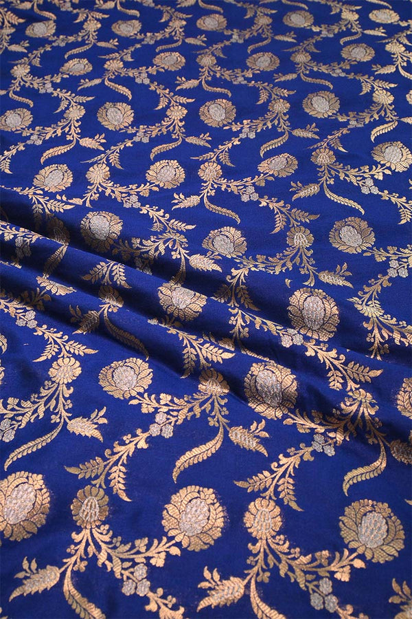 Blue fabric with gold floral patterns