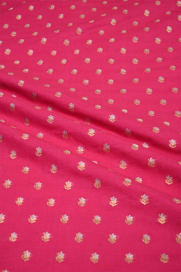 Pink fabric with gold floral patterns