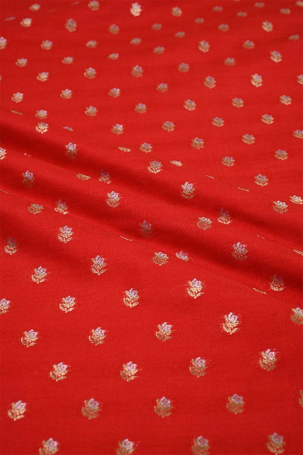 Red fabric with gold floral patterns