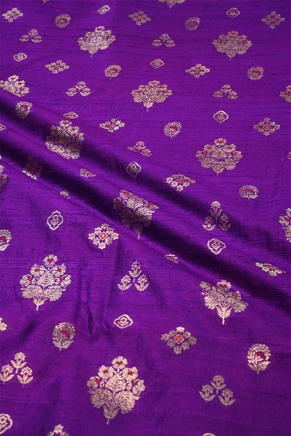 Purple fabric with gold floral patterns