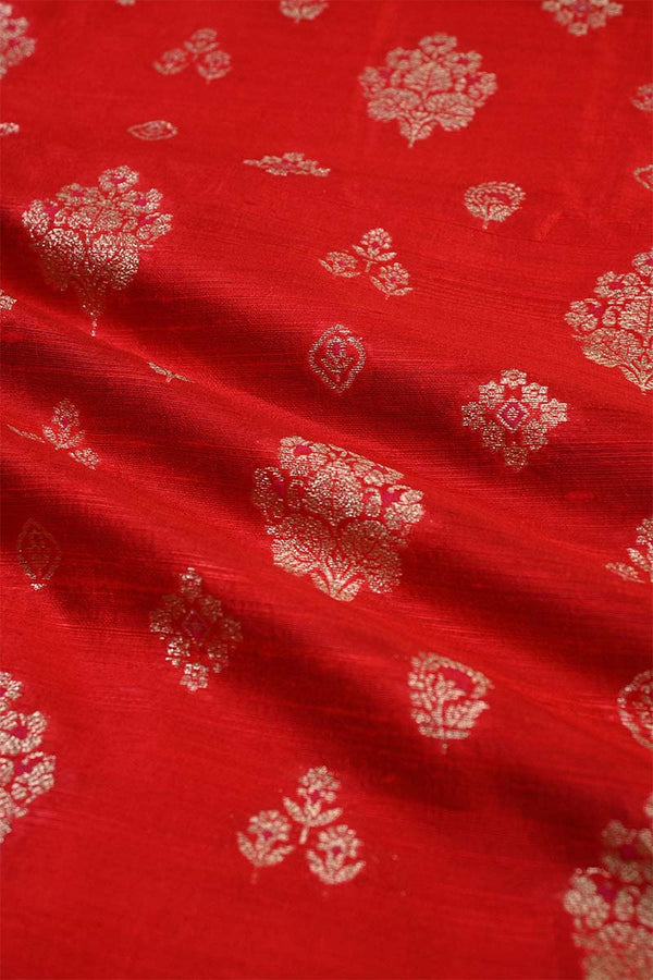Red fabric with gold floral patterns