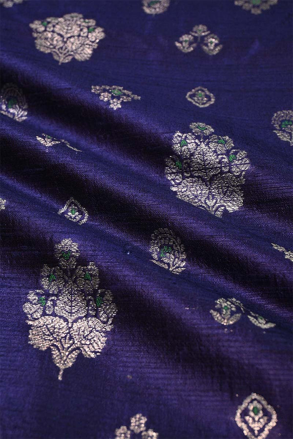 Navy blue fabric with silver floral patterns