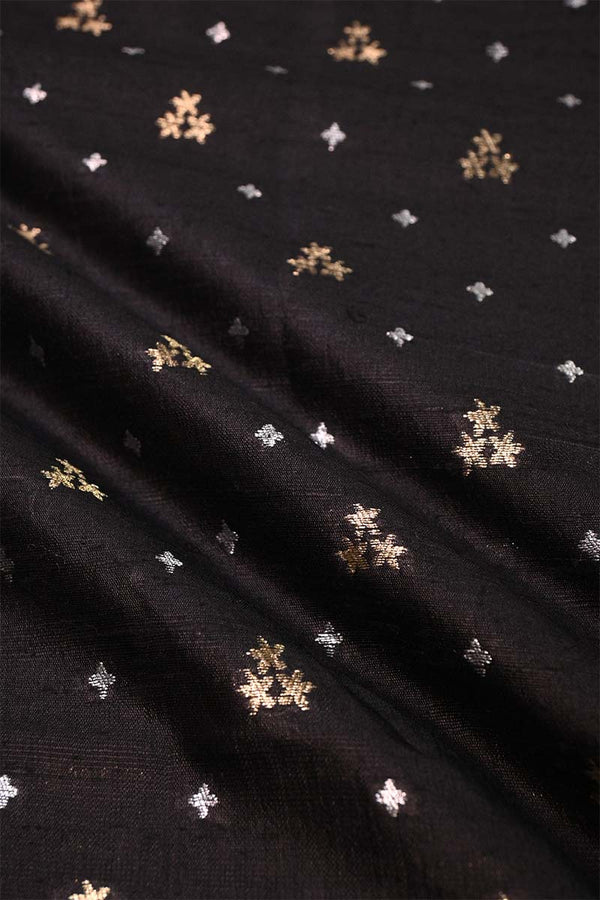 Black fabric with gold and silver star patterns