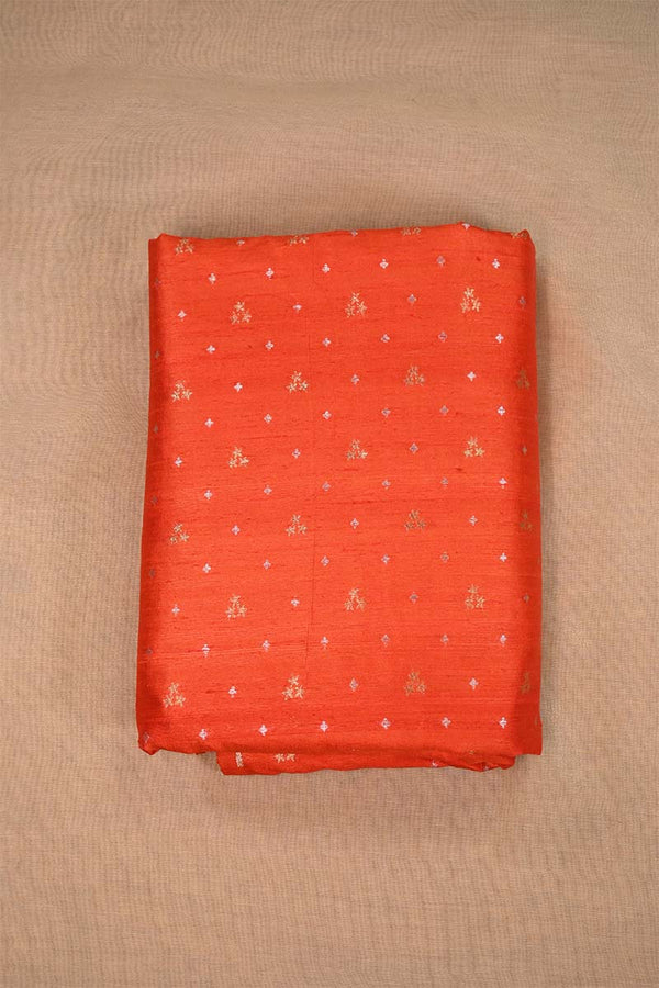 Orange Raw Silk Fabric with Gold and Silver Motifs