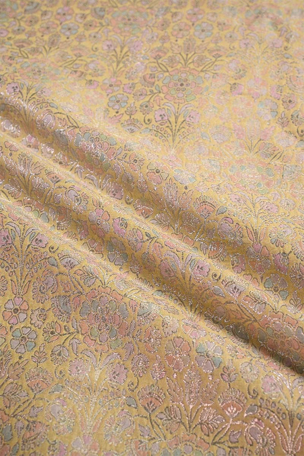 Floral patterned fabric with a yellow background
