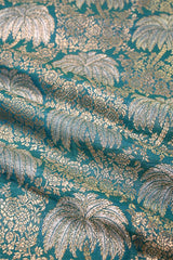 Teal Blue Banarasi Silk Fabric with Floral Jaal Palm Tree Motifs