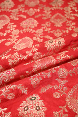 Close-up of Red fabric with white floral patterns