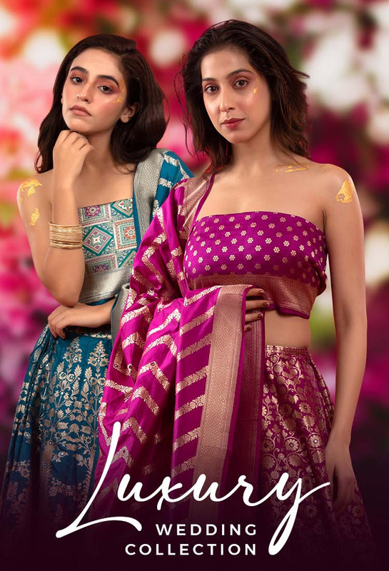 2 women presenting wedding Banarasi silk Lehengas at Chinaya Banaras