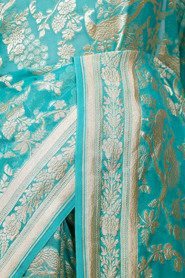 Aqua Blue Georgette Khaddi Saree with Peacock Floral Work