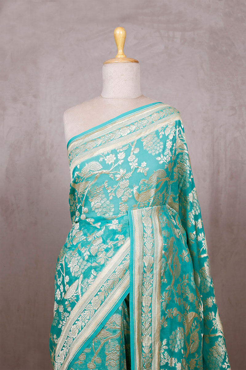 Aqua Blue Georgette Saree with Peacock Floral Work