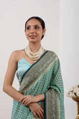 Powder Blue Banarasi Georgette Khaddi Silk Saree with Blue Border