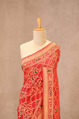 Scarlet Red Bandhej Silk Saree with Shikargah Motifs & Gharchola Pallu