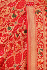 Scarlet Red Bandhej Silk Saree with Shikargah Motifs & Gharchola Pallu