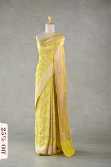 This Yellow Katan Silk Banarasi Saree with Floral Bird Motifs is a wedding saree and festive wear saree. Free Shipping Available!