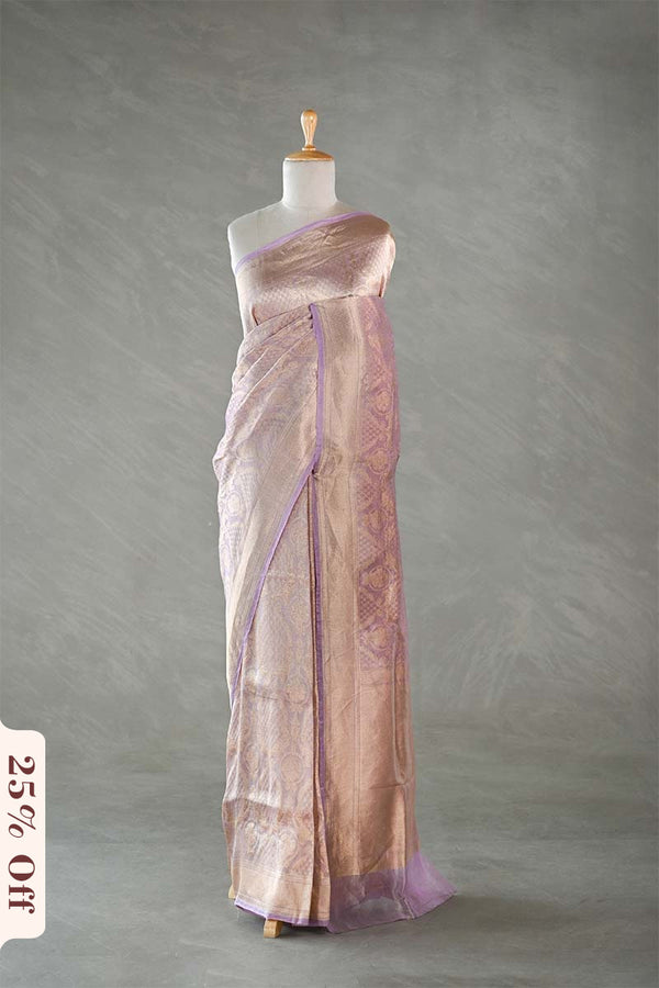 Saree on a mannequin with a gray background and '25% Off' label.