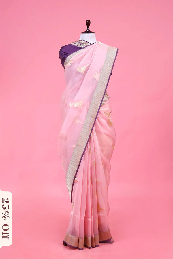 Pink saree with a mannequin on a pink background