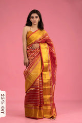 Woman wearing a yellow and red saree on a pink background with a discount label.