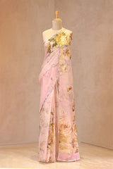 Close up of Baby Pink Kota Doria Saree showing floral and butterfly prints with handcrafted water gold lace border.
