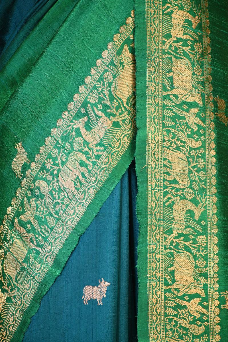 Green Banarasi Raw Silk Saree with Pichwai Cow Designs