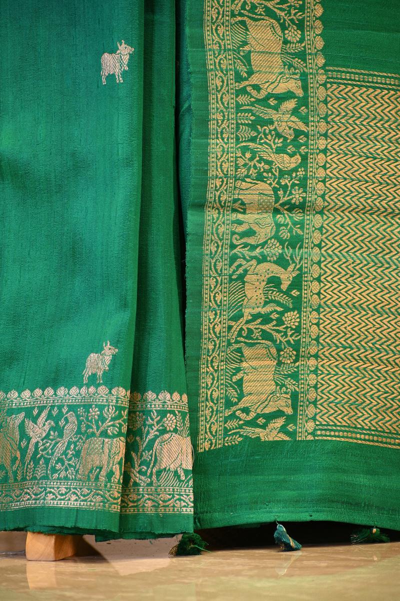 Green Banarasi Raw Silk Saree with Pichwai Cow Designs