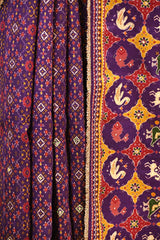 Purple Patola Printed Embellished Raw Silk Saree with Aari and Beads Work