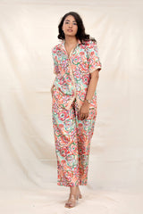 Women in  Peach Floral Splash Modal Co-Ord Set By Chinaya banaras 