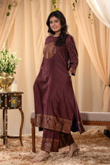 A woman in a brown traditional Kurti co-ord set standing. brown Wedding Kurti Salwar Suit 