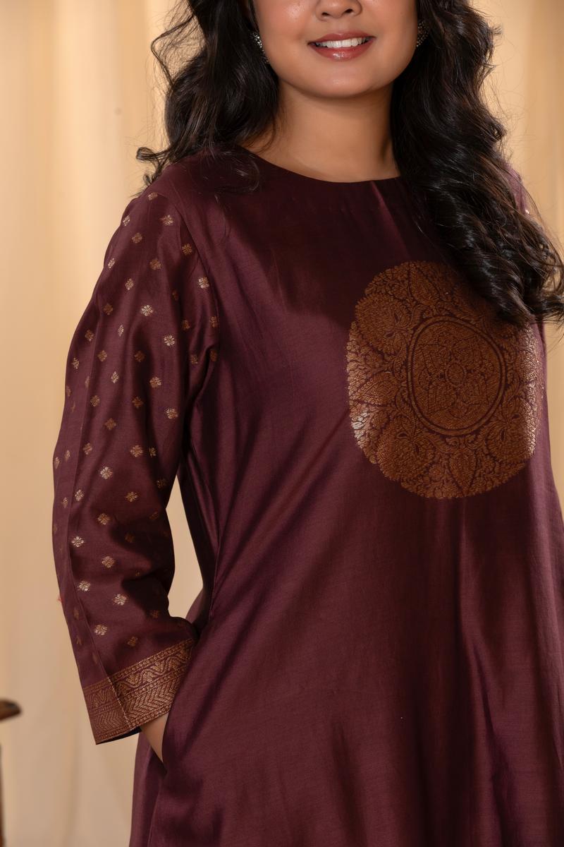 A woman in a brown traditional Kurti co-ord set standing. brown Wedding Kurti Salwar Suit  close view