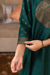 A woman in a green traditional Kurti co-ord set standing. green Wedding Kurti Salwar Suit 