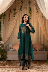 A woman in a green traditional Kurti co-ord set standing. green Wedding Kurti Salwar Suit 