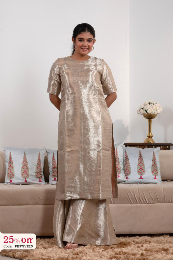 Woman wearing a metallic dress in a living room setting with a '25% Off' promotional banner.