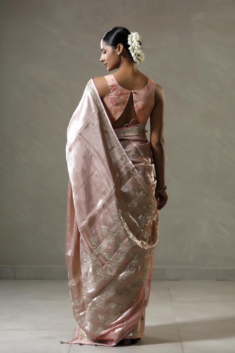 Baby Pink Tissue Silk Saree with Silver Zari Floral Work