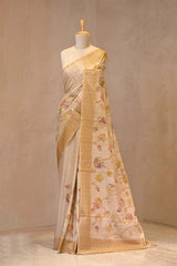 Close up of Beige Applique Tussar Silk Saree showing multicolor digital printed floral applique work and resham woven embroidered border.