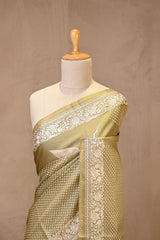Matte Olive Green Tussar Silk Saree With Pakshi Motif and Parsi Border