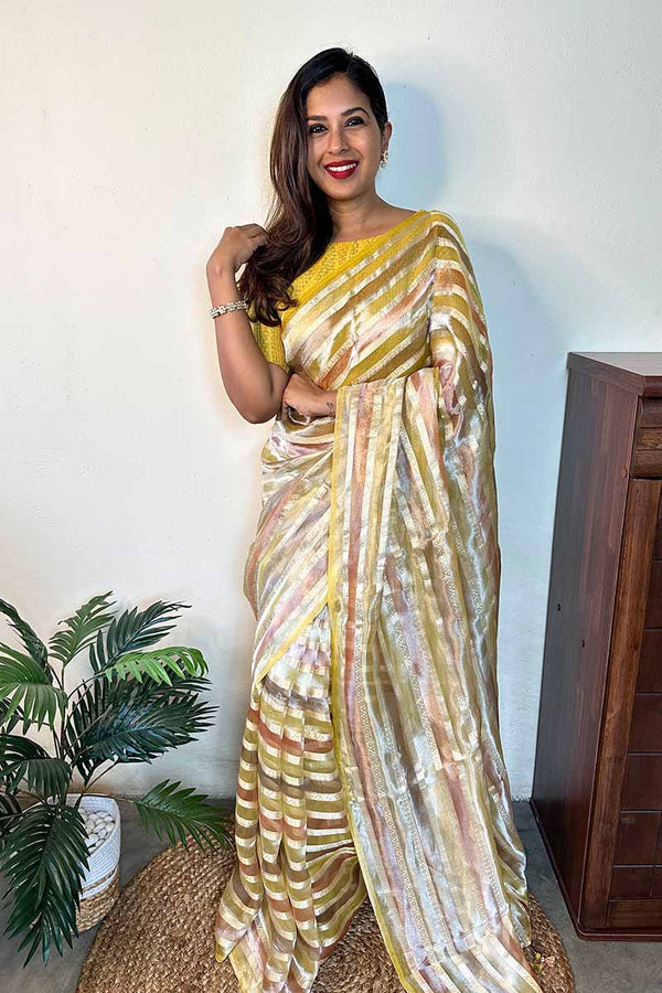 Women In Yellow Handwoven Tissue Silk Saree At Chinaya Banaras