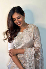 Sunitha Scharma In Caramel Brown Embellished Tissue Silk Saree